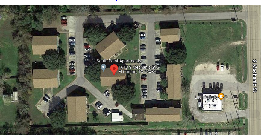 a map of a neighborhood with a street address and a parking lot