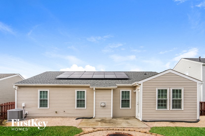 a house with solar panels on the roof