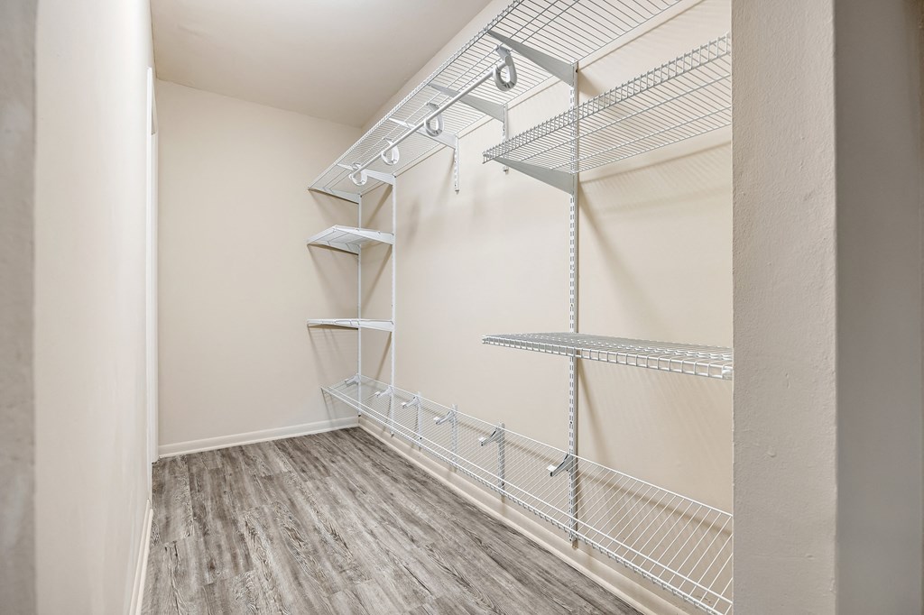 our spacious closets are equipped with shelves and hooks for hanging clothes