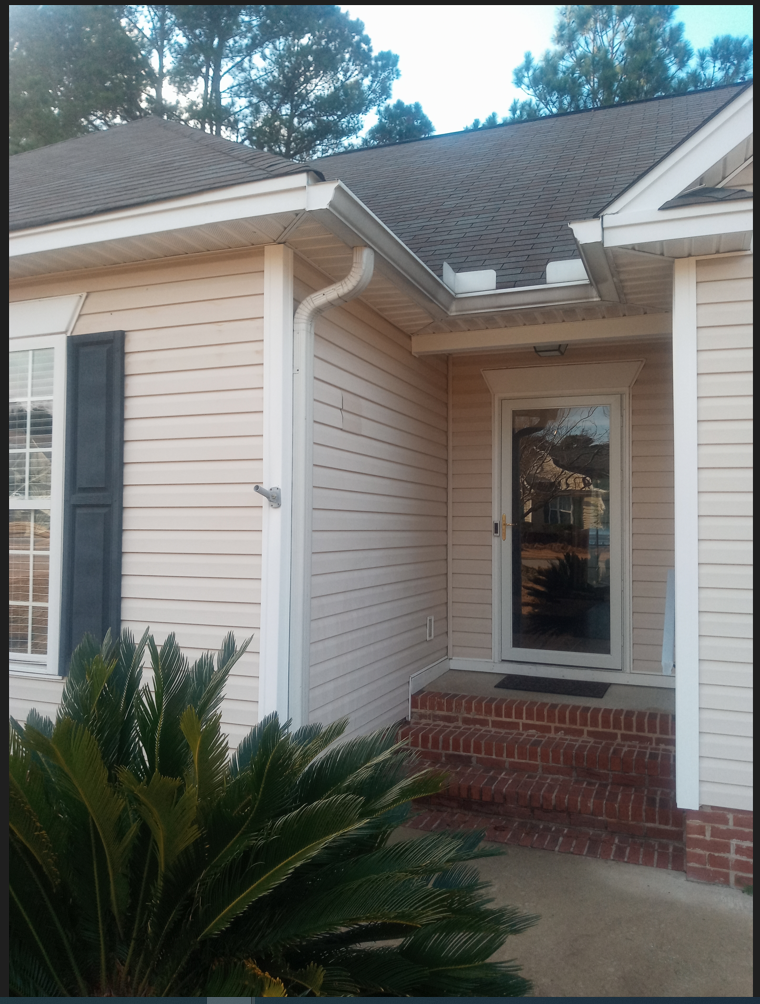 A house with a window and a door.