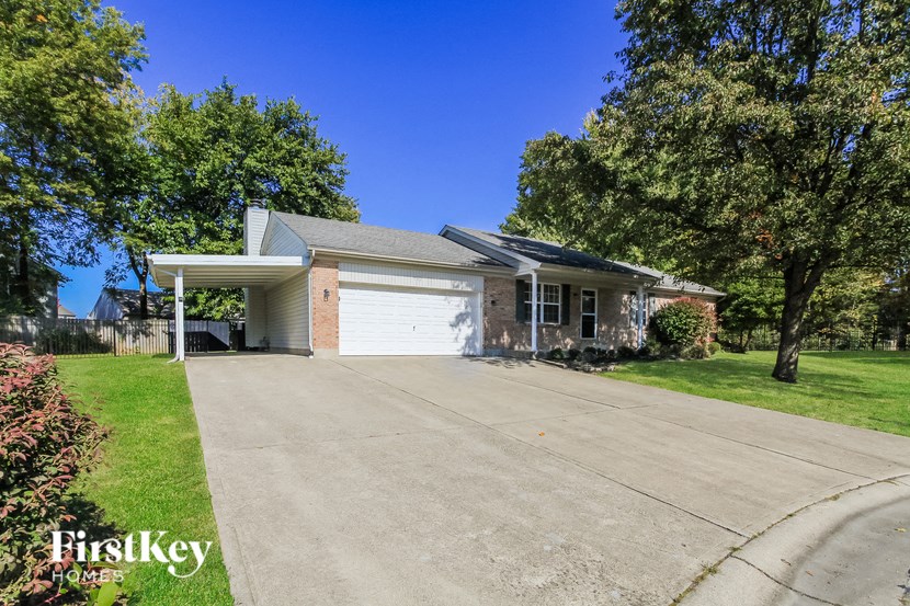 A house with a garage is for sale by FirstKey Homes.