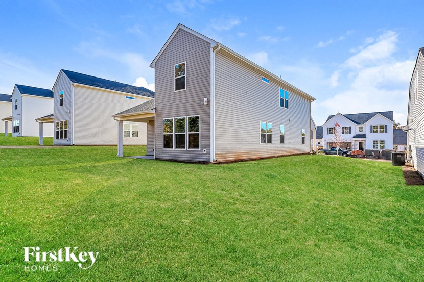 a house with a yard in front of it