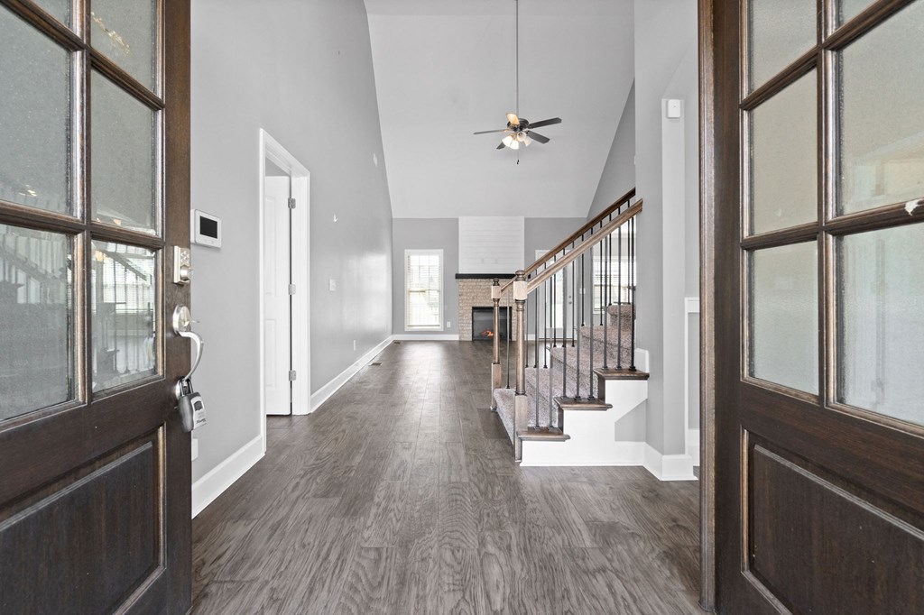 the view of the entryway from the front door of a house