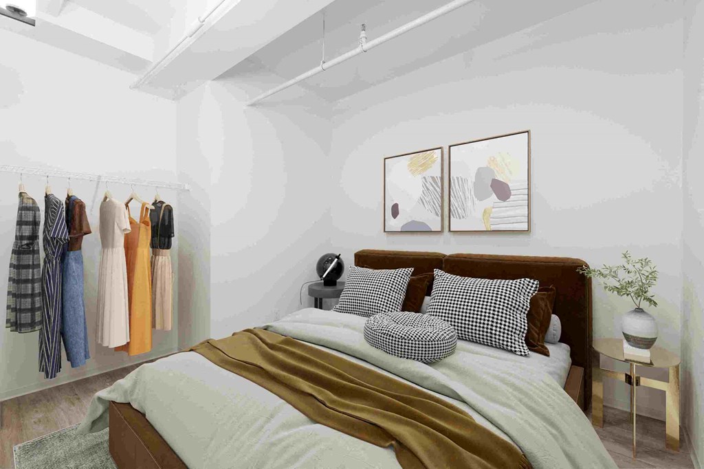 a bedroom with a bed and a closet