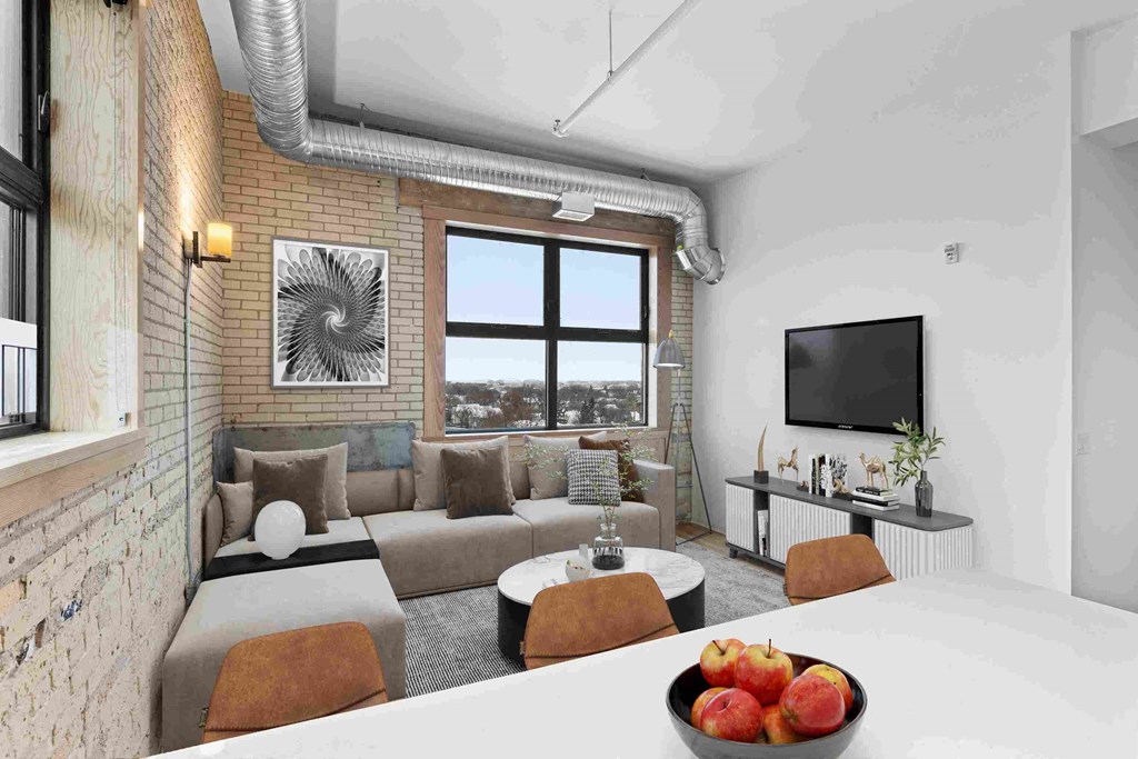 a living room with a couch and a table