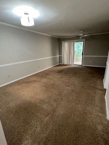 an empty living room with carpet and a window