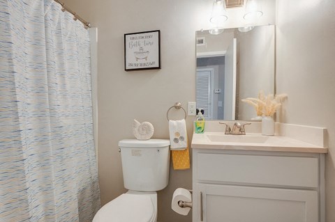 a small bathroom with a toilet and a sink