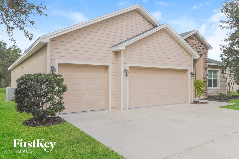 A two-car garage is attached to a house.
