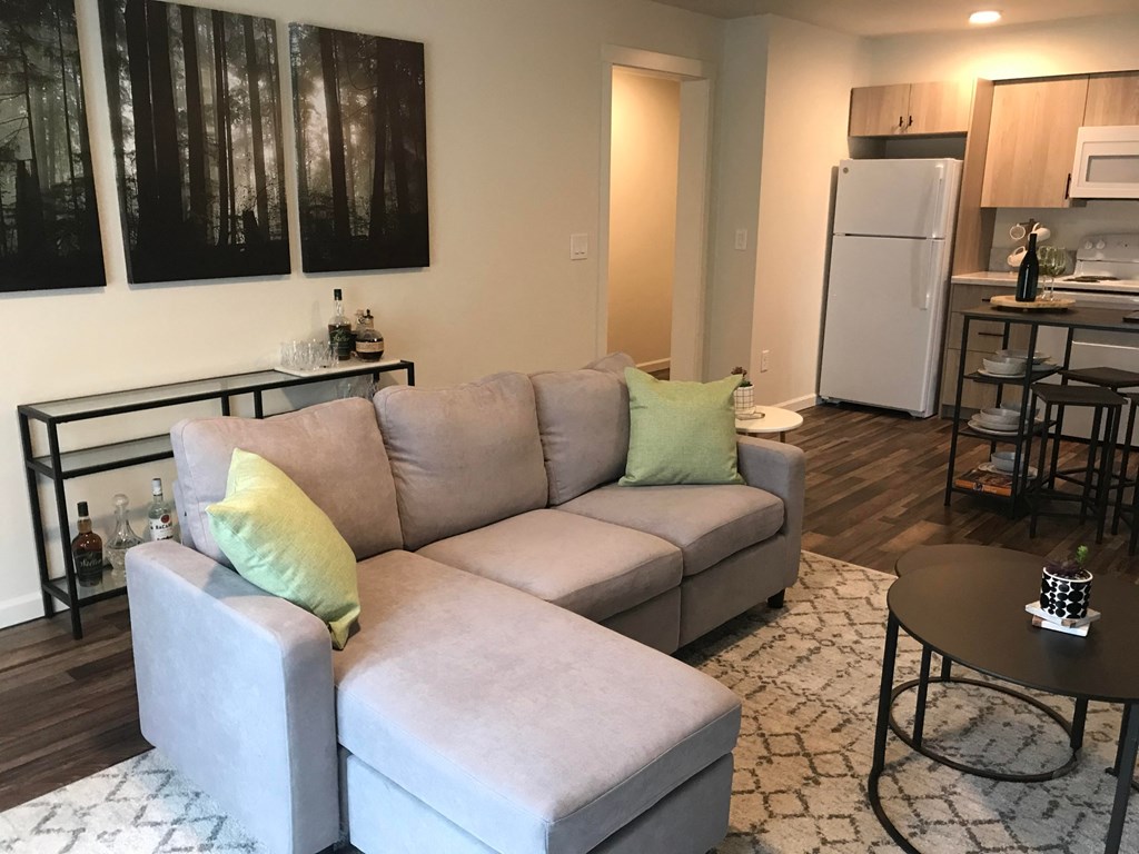 a living room with a couch and a table