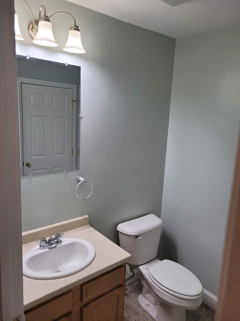 a small bathroom with a toilet and a sink
