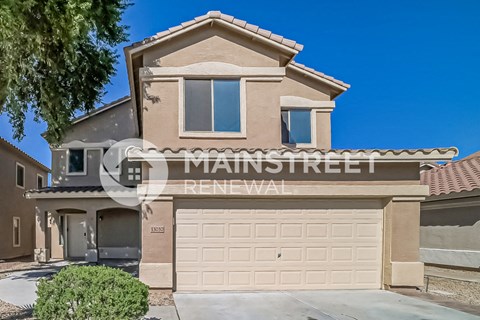 a house with a garage and a driveway