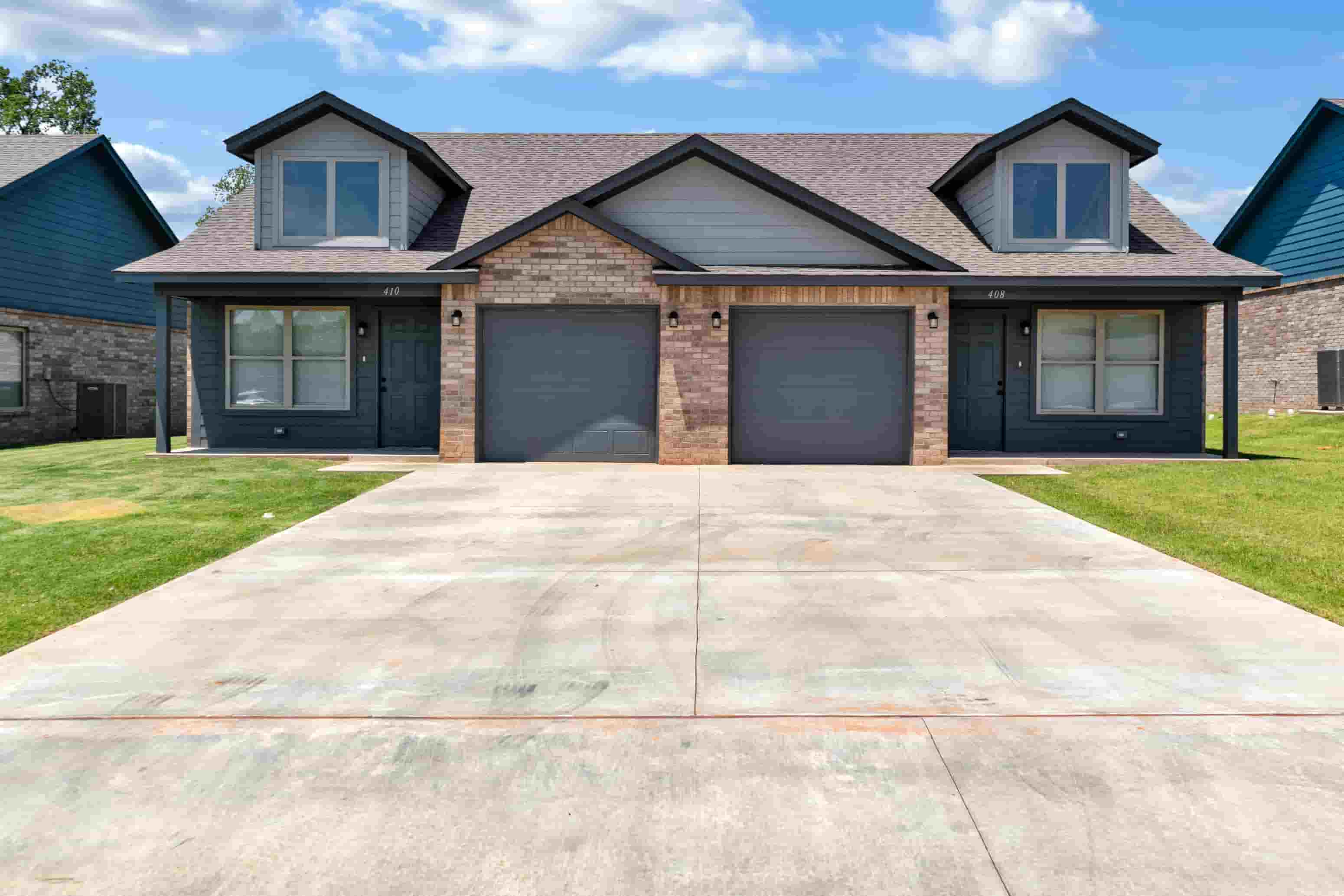 a large driveway in front of a house