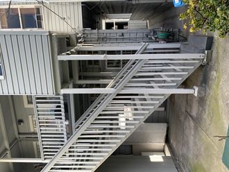 a set of stairs on the side of a building