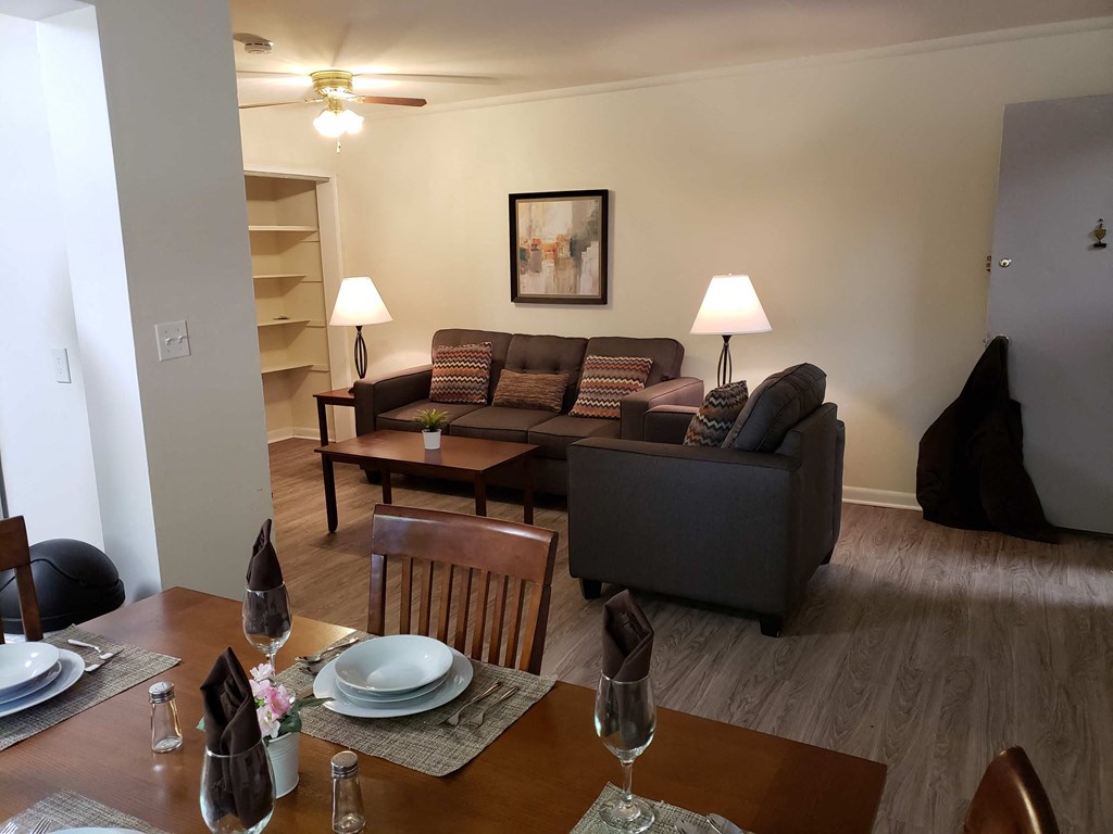 a living room with a couch and a table