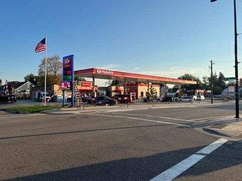 a gas station on the corner of a street