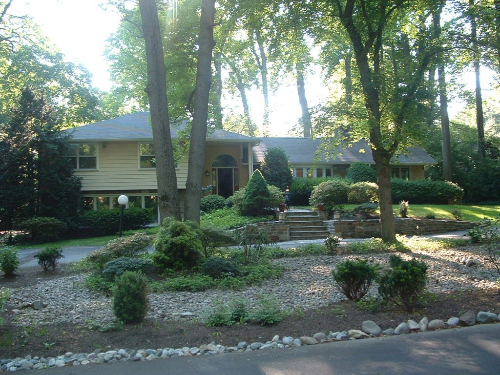a house with a garden in front of it