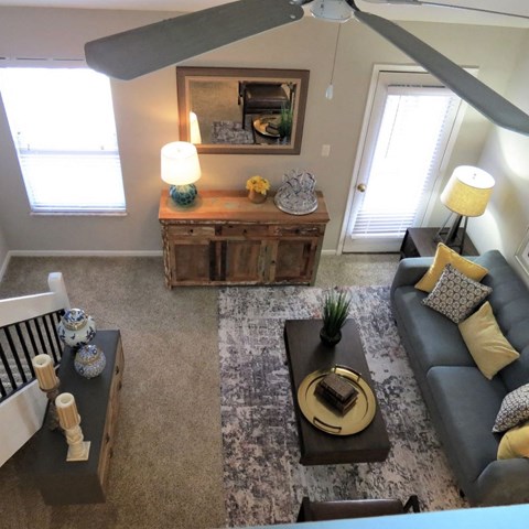 a living room with a couch and a table