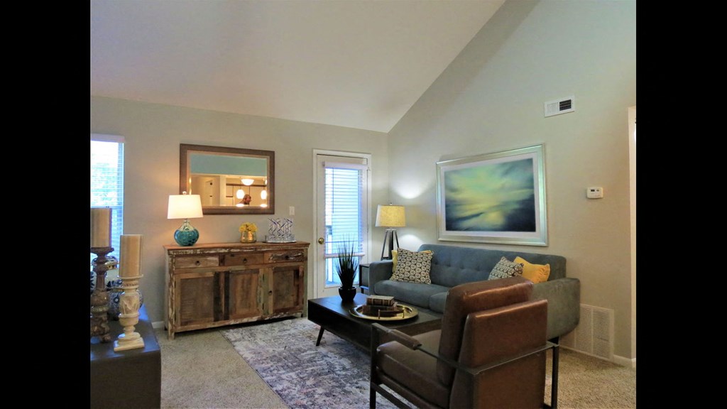 a living room with a couch and a table