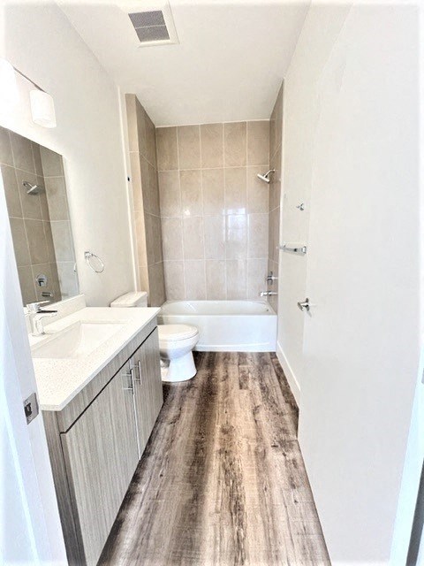 a small bathroom with a toilet and a sink