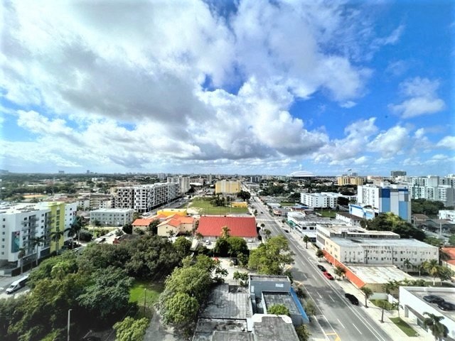 a view of the city from the roof of a building