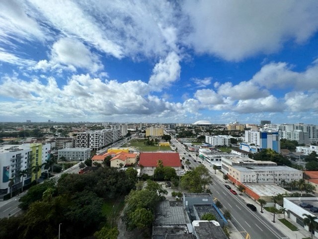 a view of the city from the roof of a building