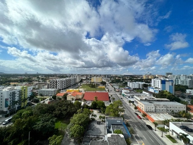a view of the city from the roof of a building