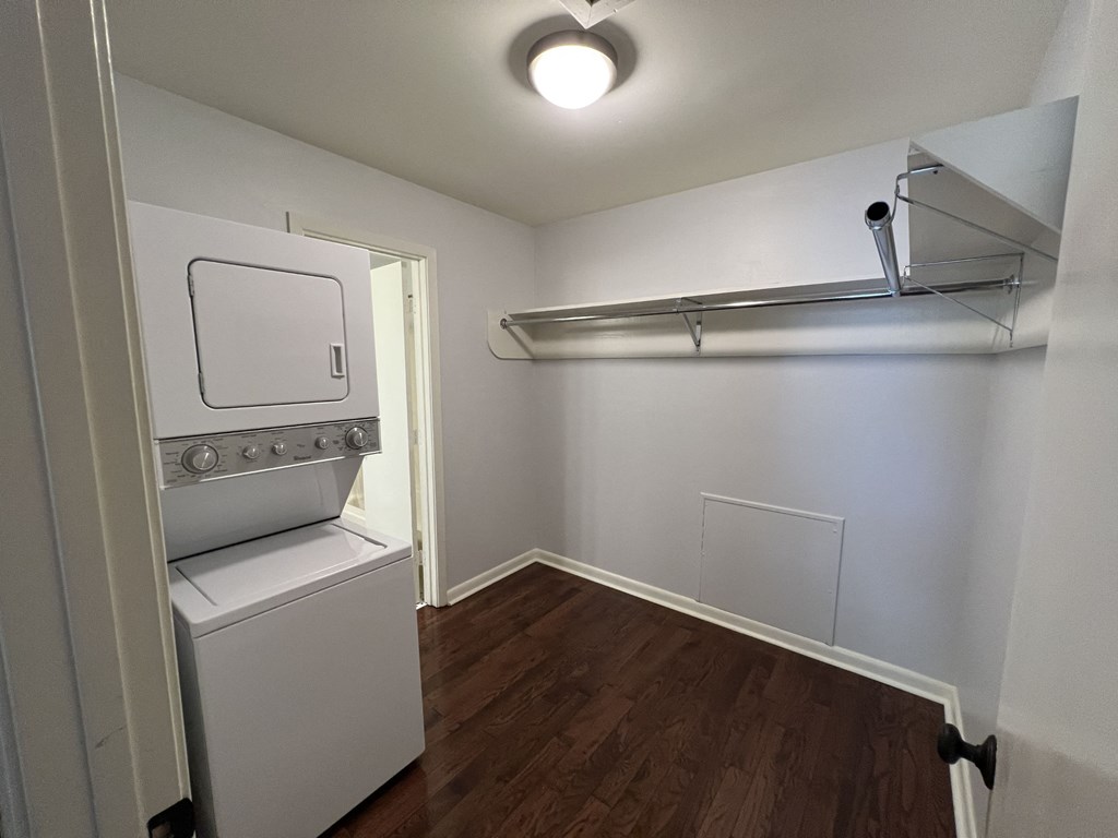a small laundry room with a washer and dryer