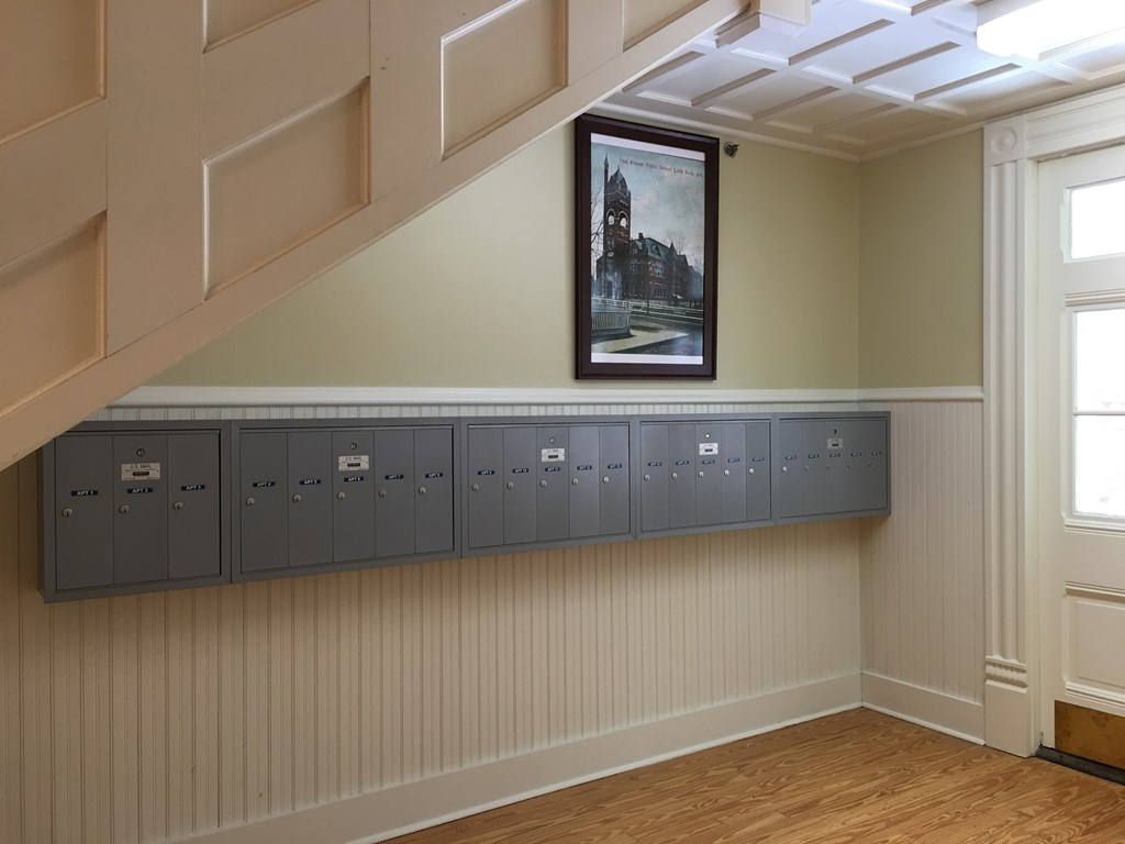 a view of the lockers under the stairs of a house