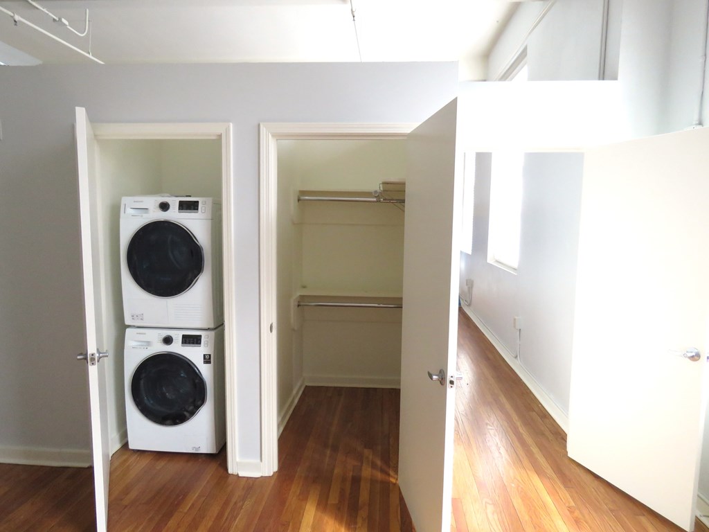 a small laundry room with a washer and dryer in a closet