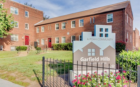 a church building with a sign outside ofgarfield hills