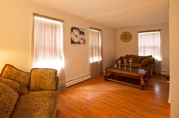 a living room with a couch and a coffee table