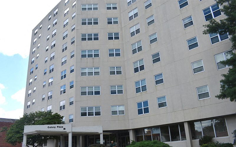 a large building with many windows on the side of it