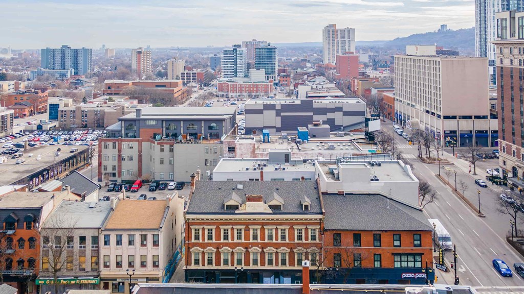 a view of the city from above of a city street and buildings