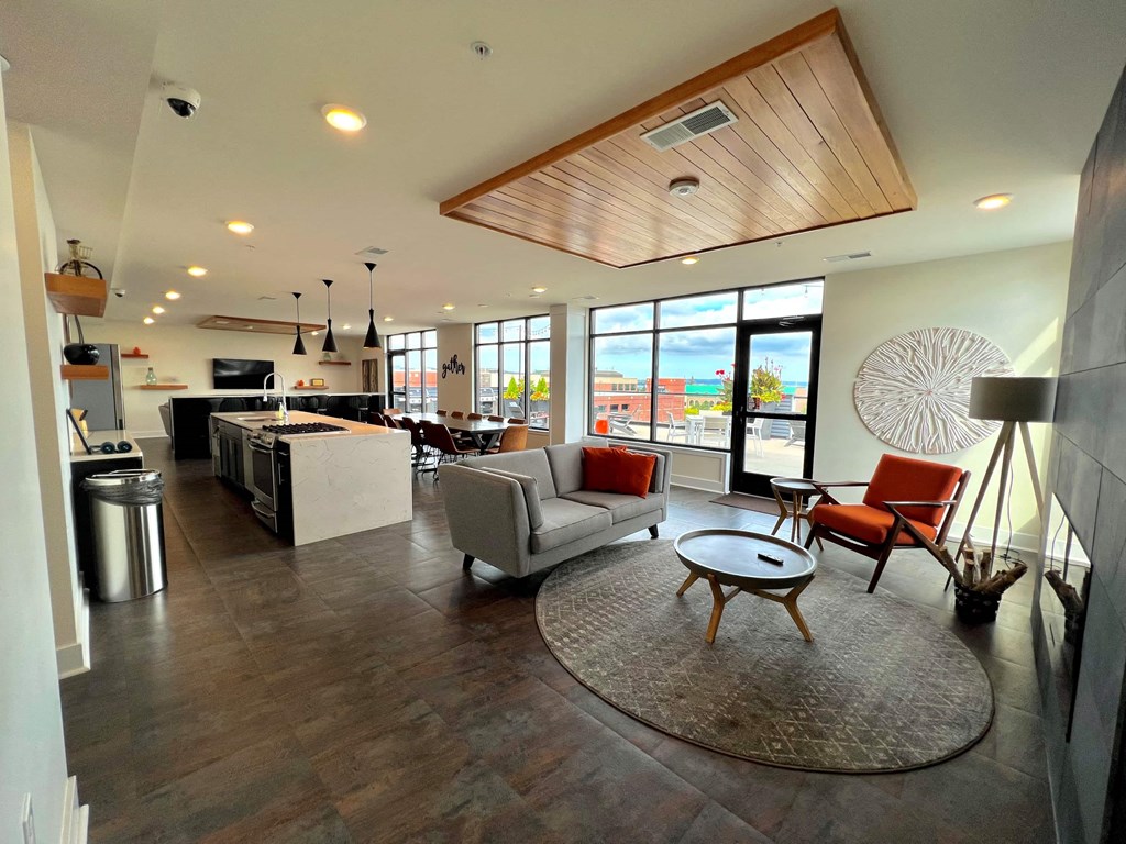 a view of the living room and kitchen of a house