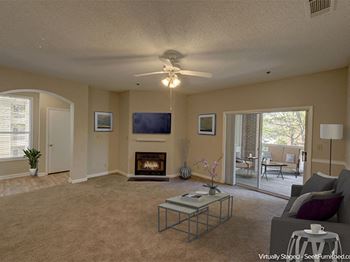 Living Room with Fireplace at Cambridge Apartments, Raleigh, NC