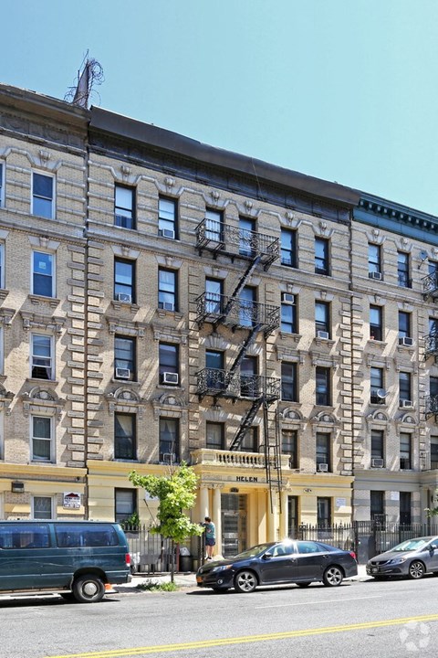 A street view of a building with a sign that reads "HELEN".