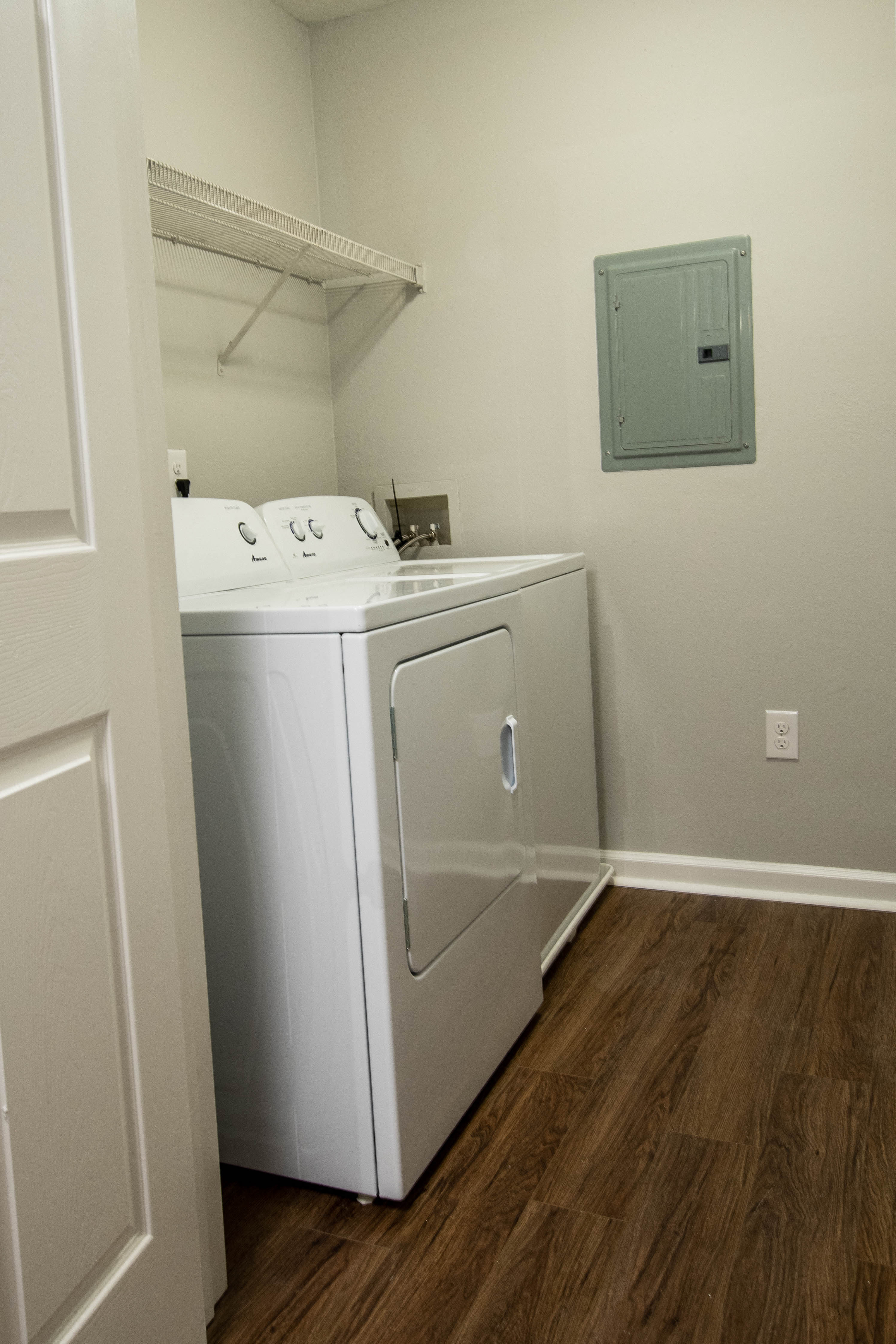 a washer and dryer in a small room in a home