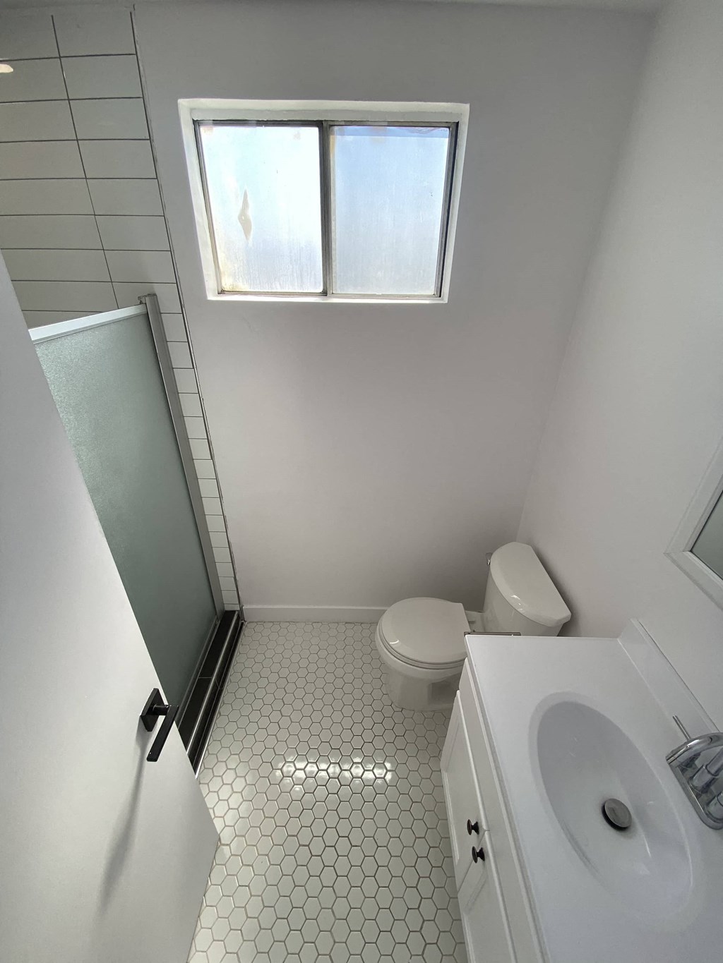 a small bathroom with a toilet and a sink