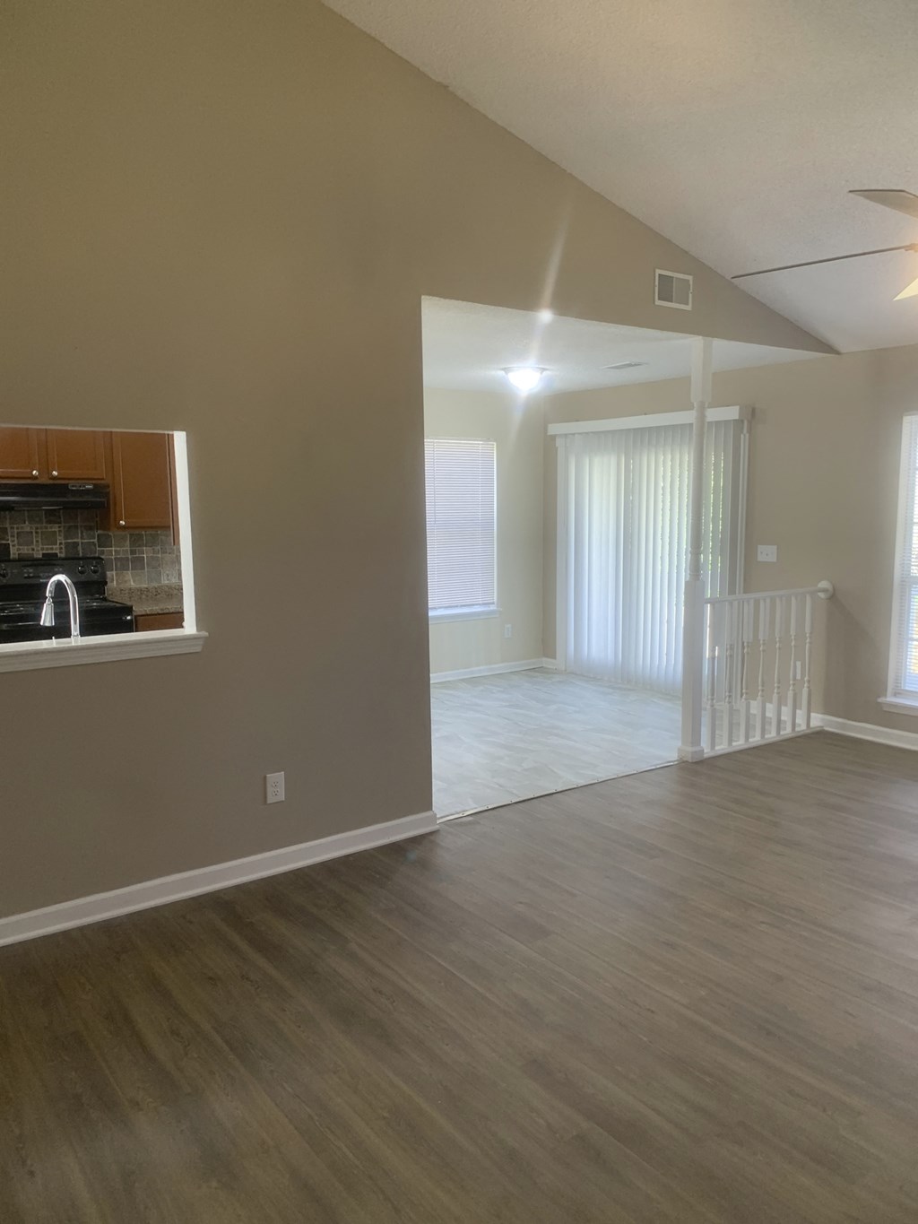 the living room and kitchen of a new home