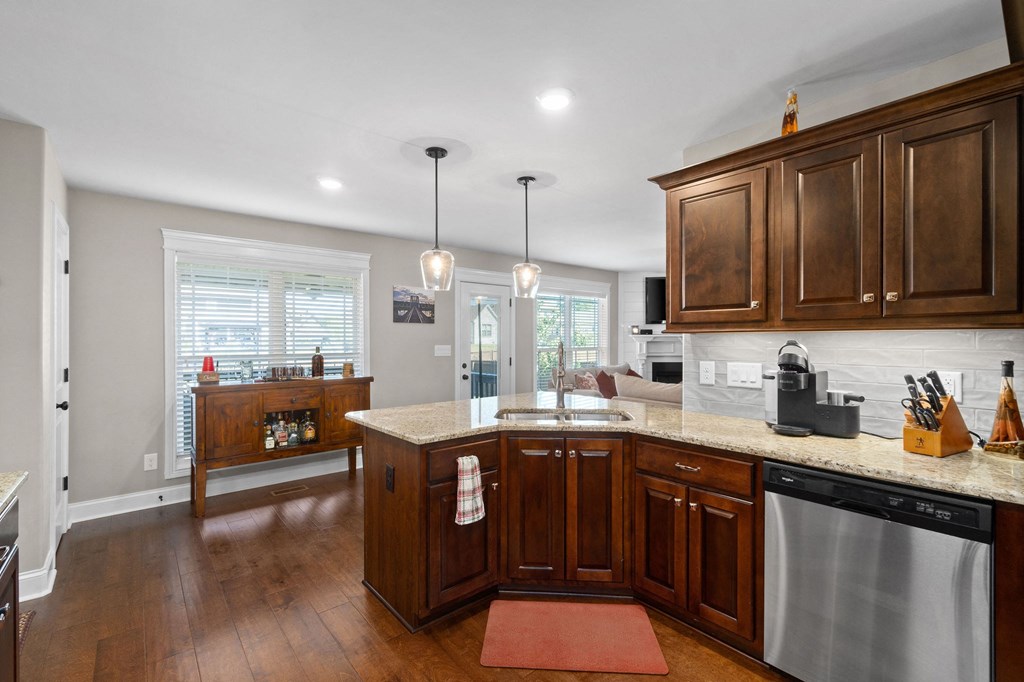 a kitchen with wooden cabinets and a counter top