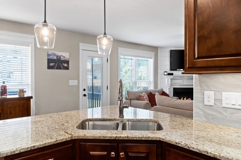 a kitchen with a sink and a counter top