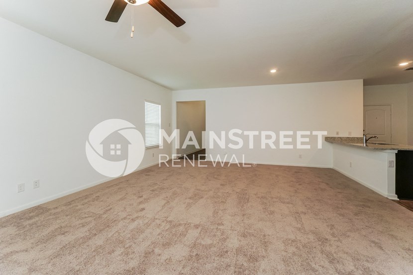 two bedroom apartment with a living room and a kitchen