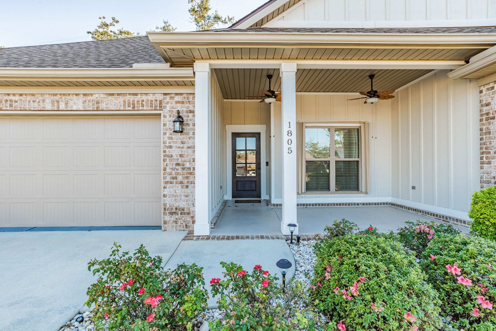 A house with a garage and a front porch.