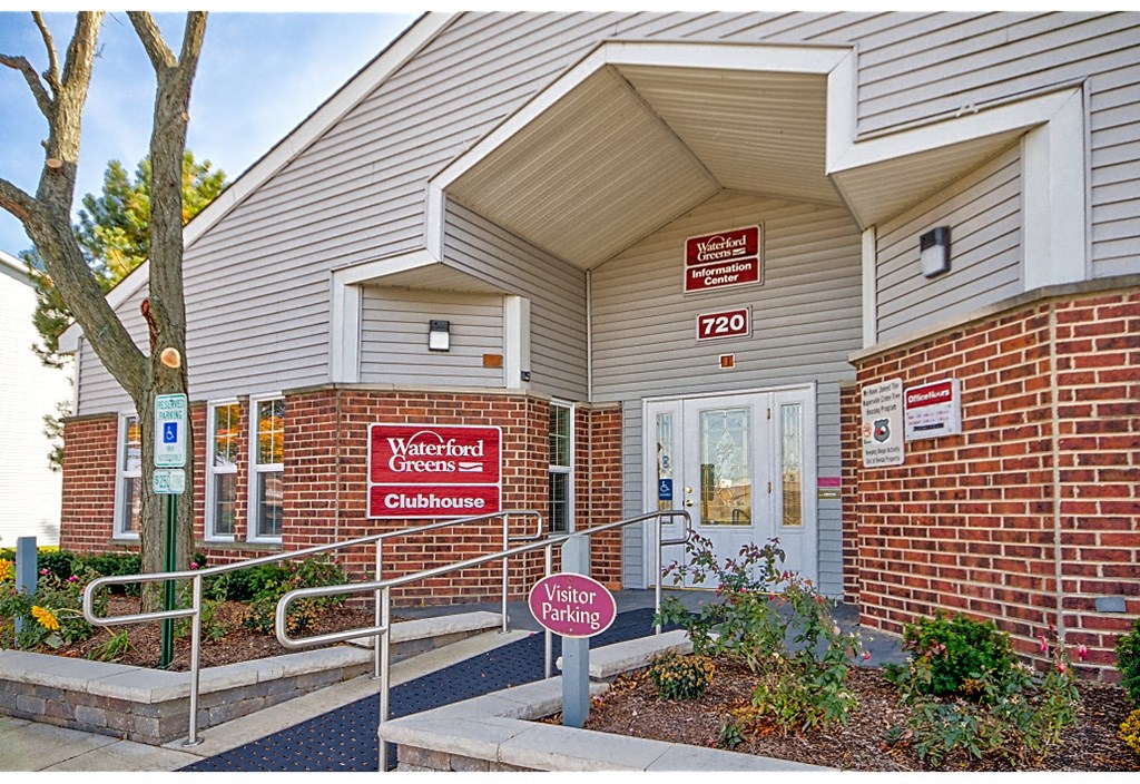 the front of the medical center building with a stop sign