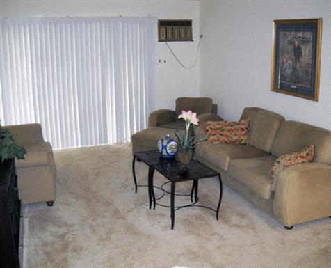 a living room with a couch and a coffee table