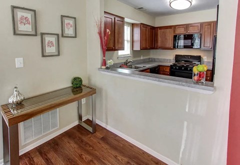 a kitchen with a counter top and a sink
