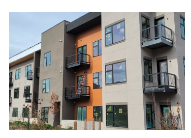 an exterior view of a building with balconies