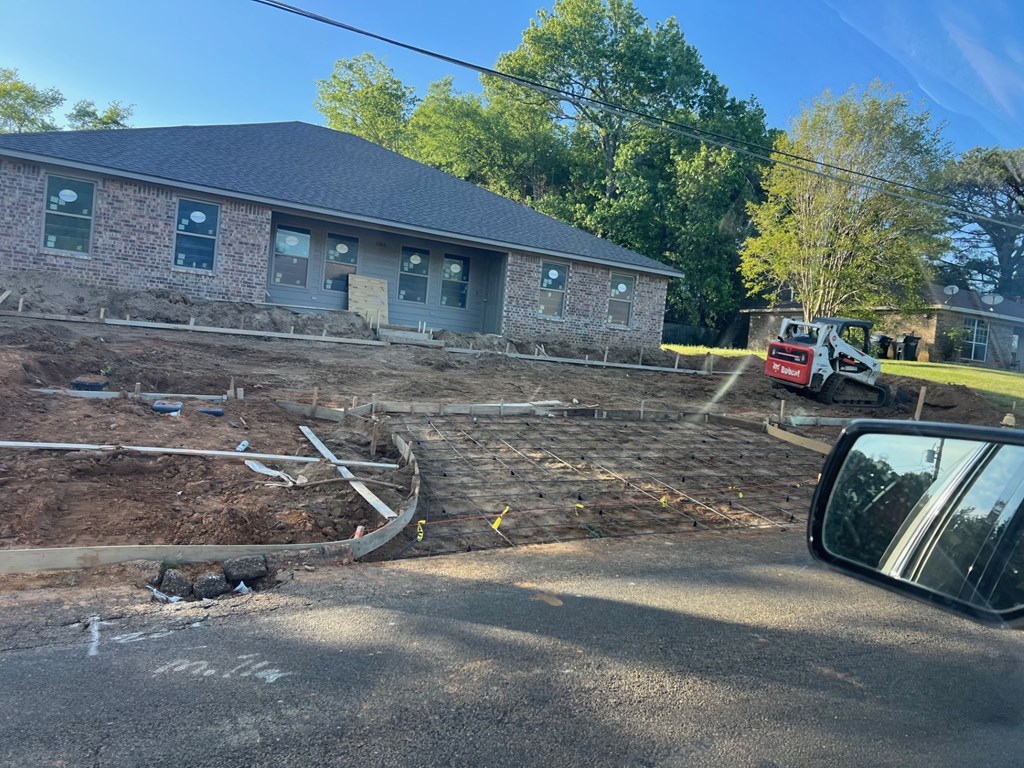 a house with a lot of dirt in front of it