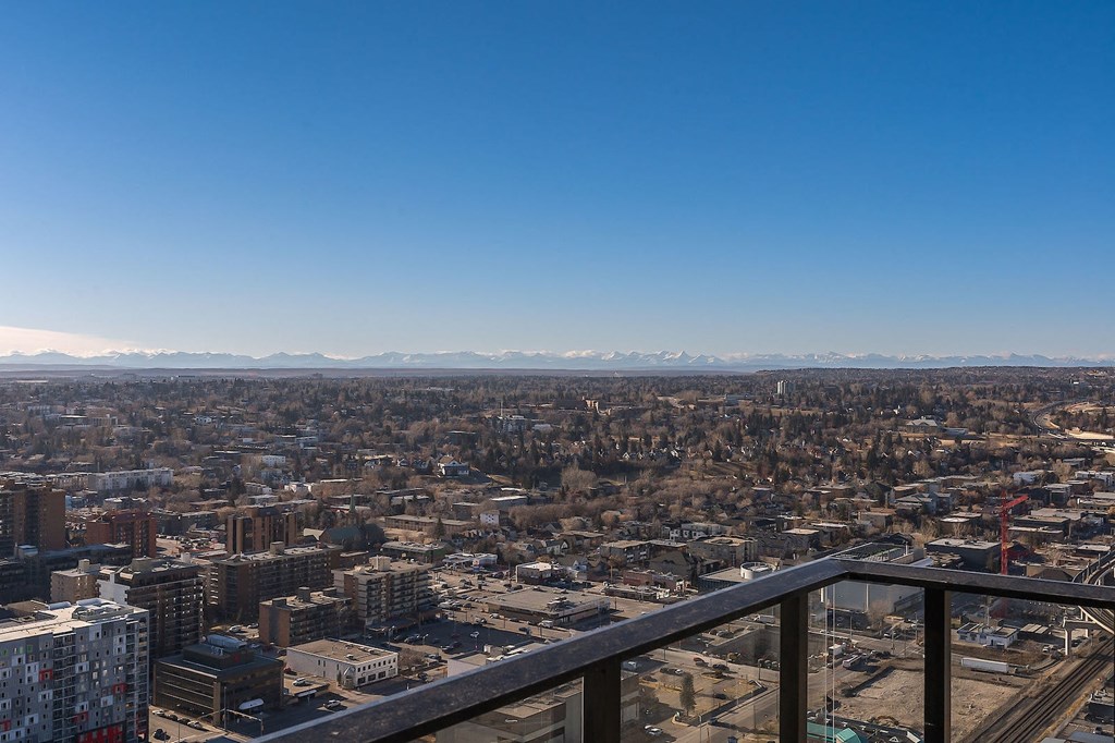 a view of the city from the top of a skyscraper