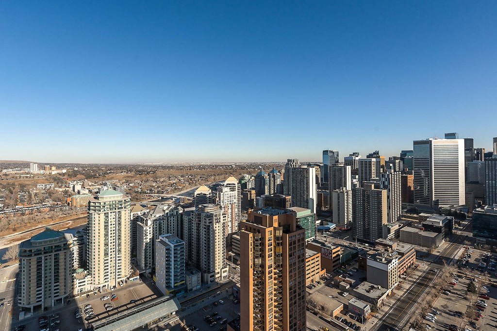 a view of the city from the top of a skyscraper